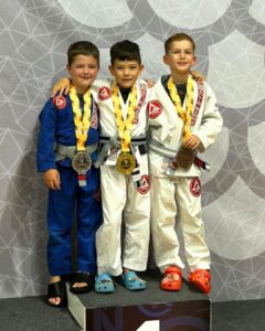 Gracie Barra Headquarters Sydney kids Gi podium CompNet Hunter Valley 2026