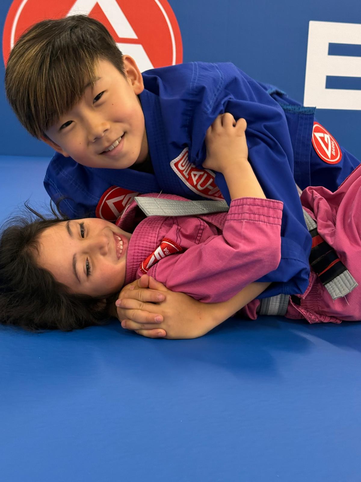 Kids training Brazilian Jiu-Jitsu at Gracie Barra Artarmon, supporting families from Lane Cove, Crows Nest, Chatswood, Willoughby, North Sydney, and the wider North Shore.