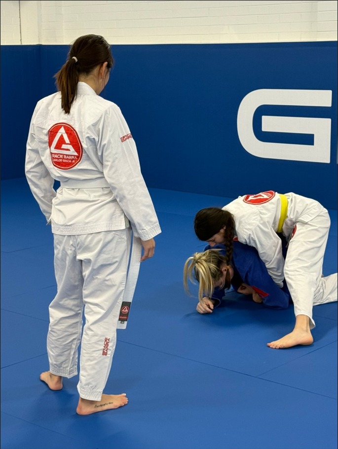 Women practising Brazilian Jiu-Jitsu self defence at Gracie Barra Artarmon