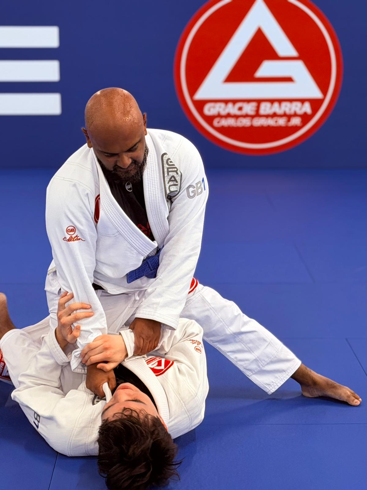 Advanced Brazilian Jiu-Jitsu students sparring at Gracie Barra Artarmon