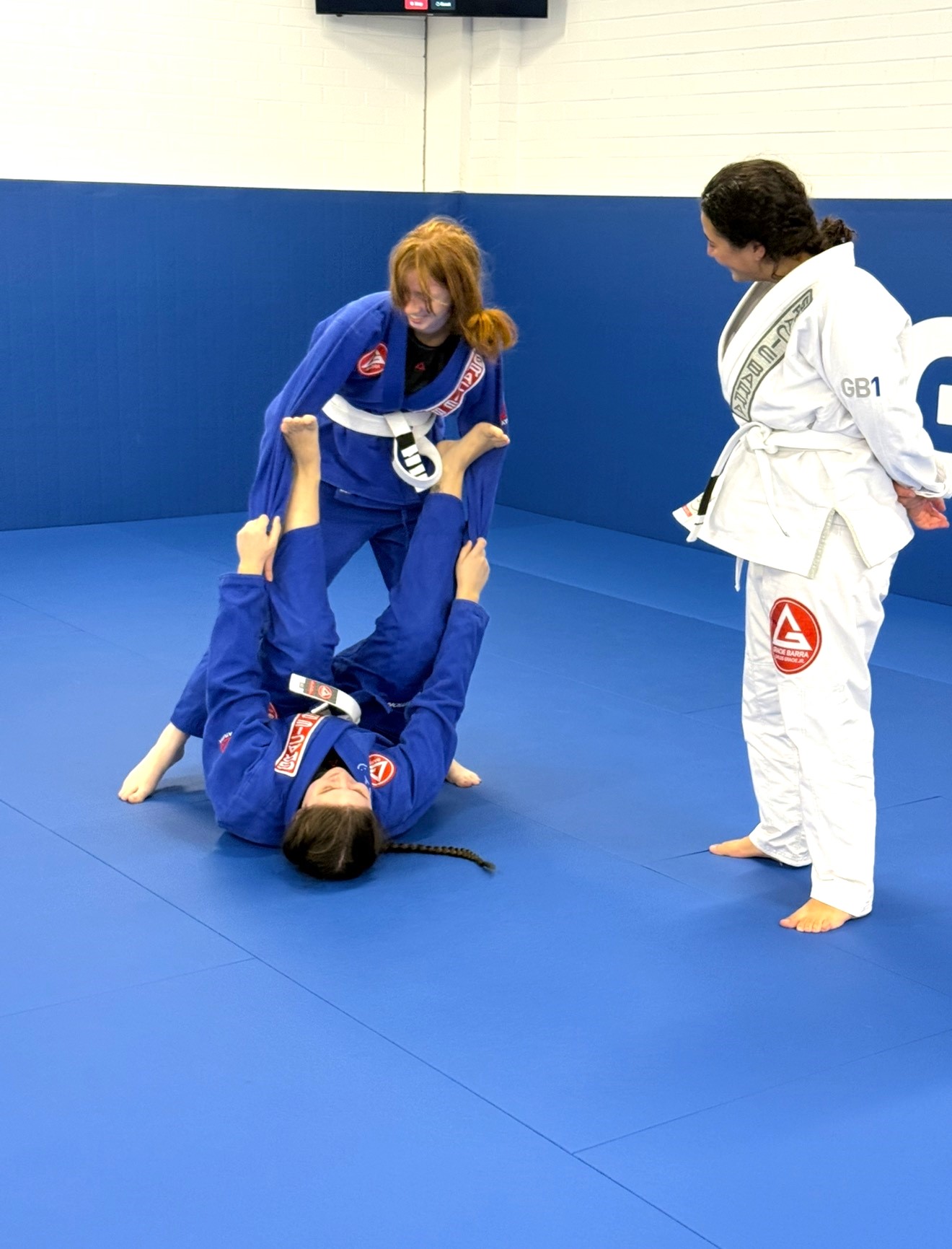 Women learning Brazilian Jiu-Jitsu fundamentals at Gracie Barra Artarmon