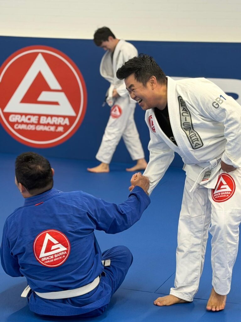 Professionals training Brazilian Jiu-Jitsu at Gracie Barra Artarmon