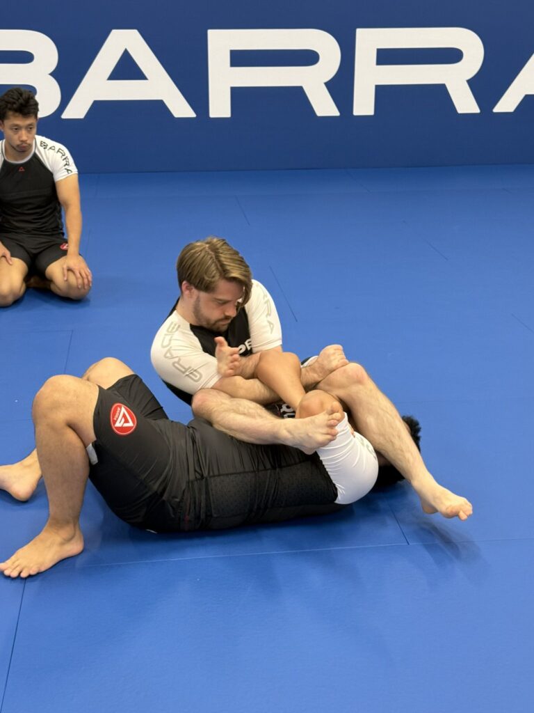 Adults training Brazilian Jiu-Jitsu for mental wellbeing at Gracie Barra Artarmon