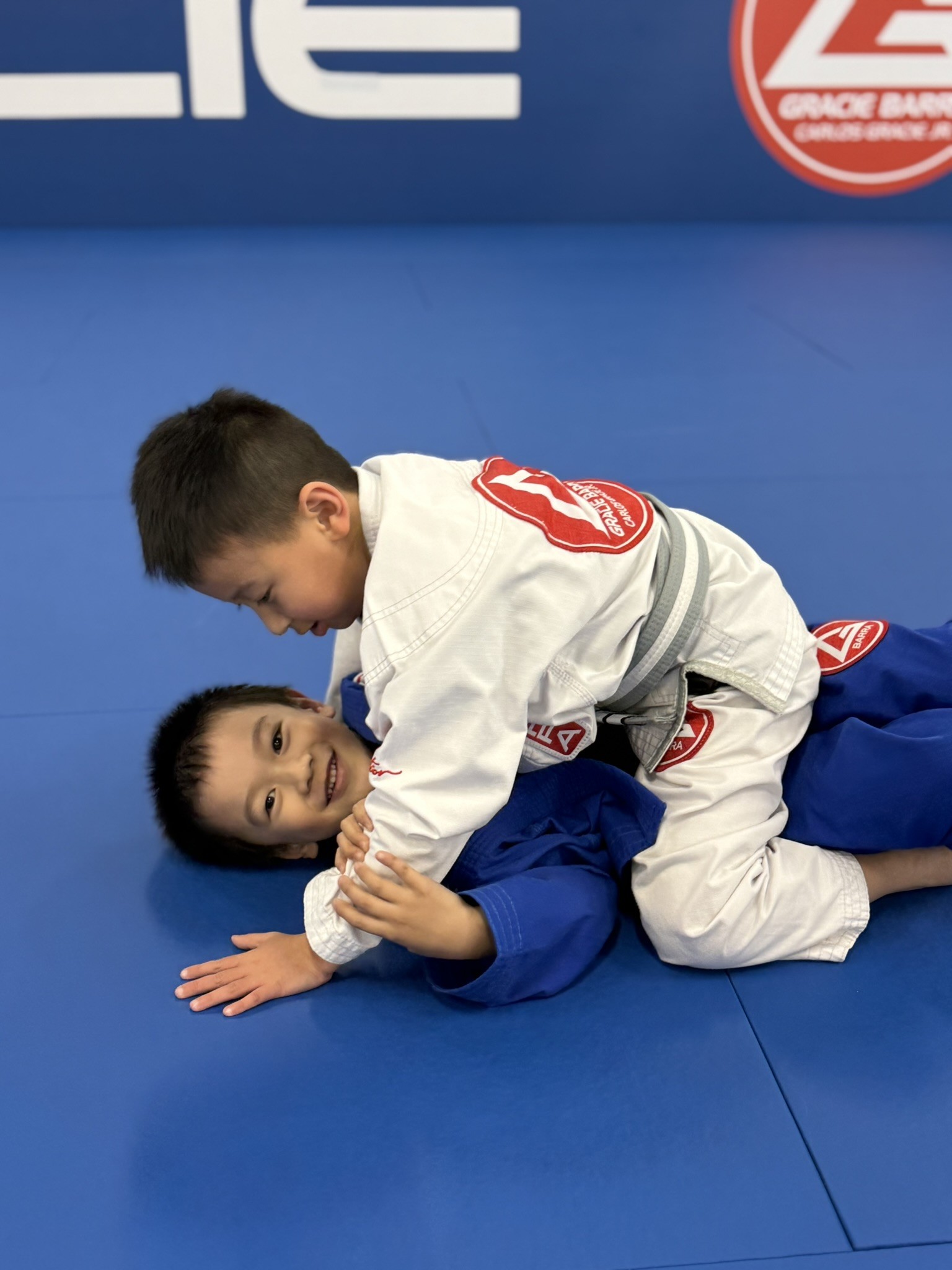 Child building independence through Brazilian Jiu-Jitsu training at Gracie Barra Artarmon