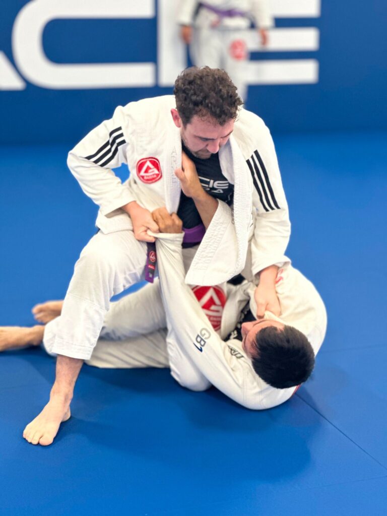 Adults staying active after work during a Brazilian Jiu-Jitsu class at Gracie Barra Artarmon