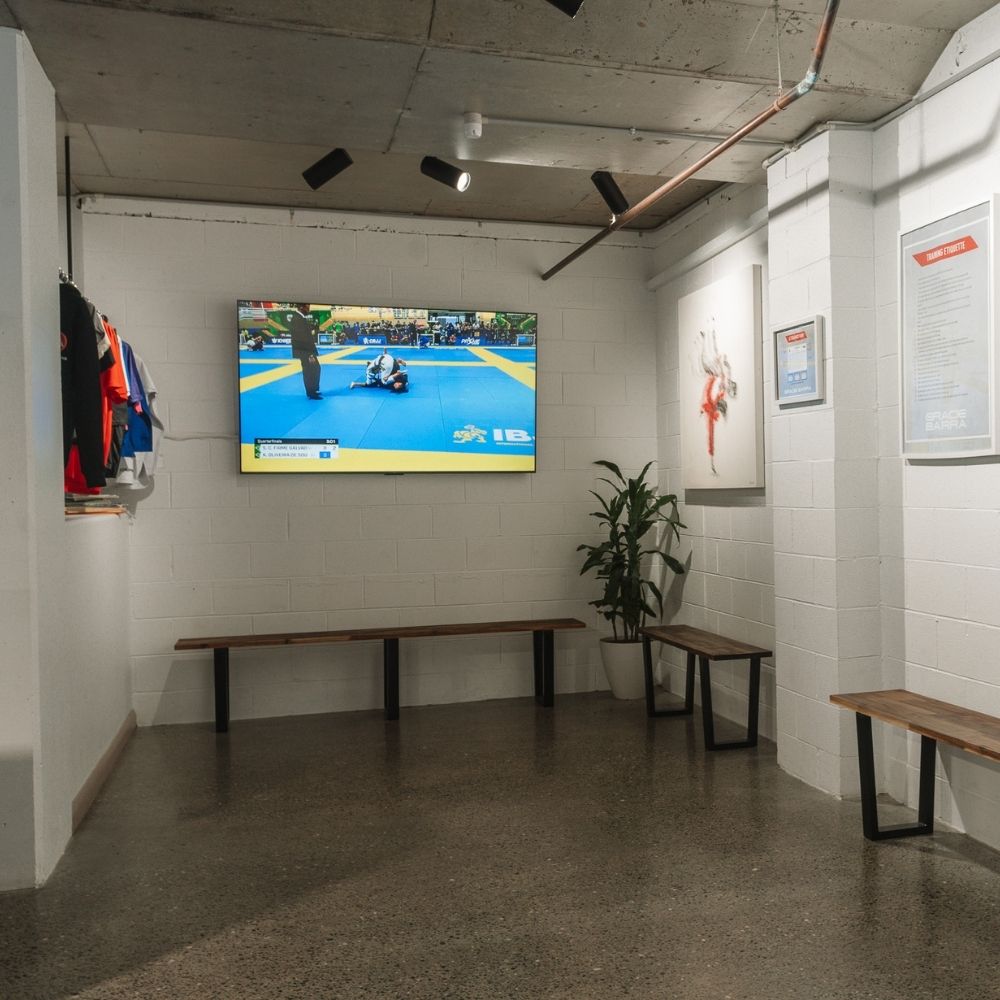 Gracie Barra Charlestown Newcastle waiting area with benches and display