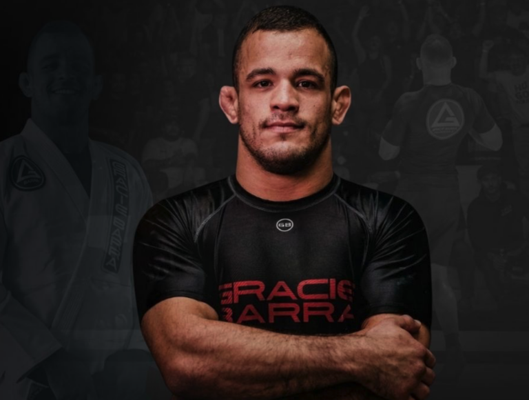 Professor Pedro Marinho standing with his arms folded