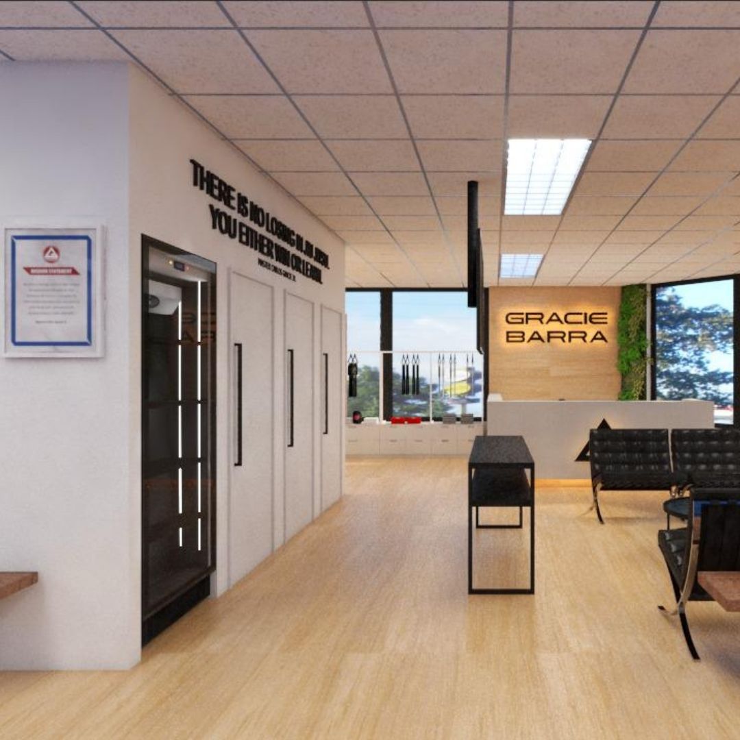 Lounge and waiting area at Gracie Barra Sydney Headquarters with modern seating and Gracie Barra signage
