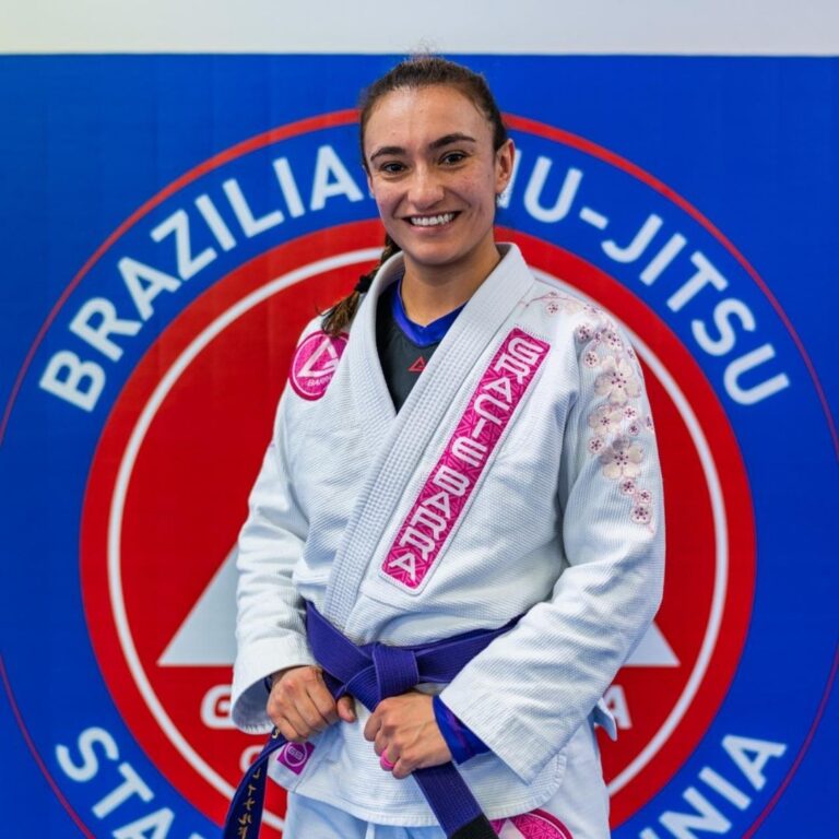 Coach Jilari Reinaldo teaching kids and adults at Gracie Barra Stafford
